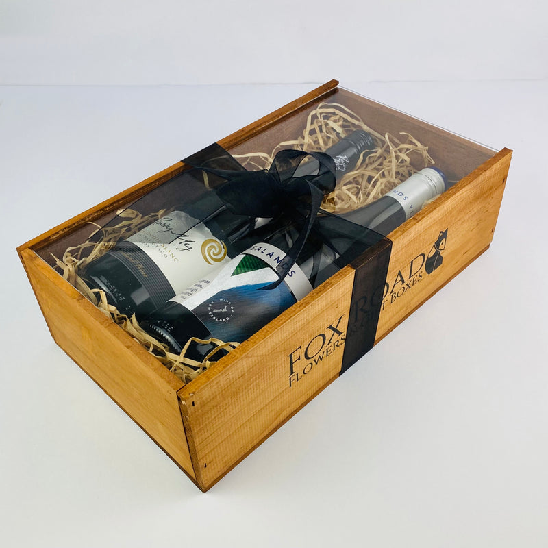 Two bottles of NZ wine in gift box with ribbon