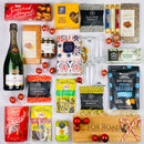 Christmas gift hamper with nuts and olives plus champagne