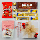 Chocolate Christmas gift box shown open with flake and Whittaker's chocolates.