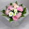 Wellington Florist placing flowers in a water-filled box