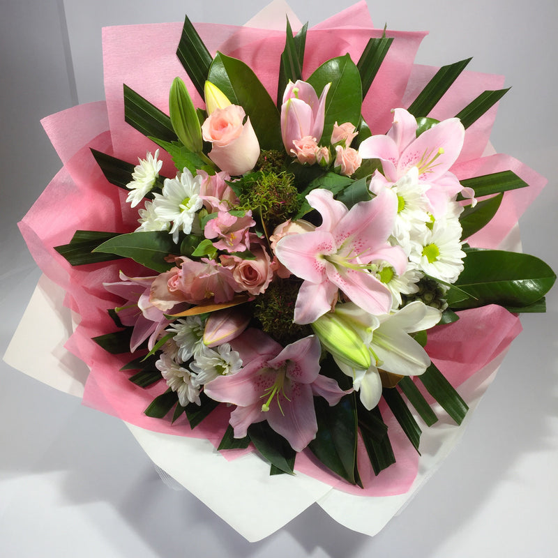 Lower Hutt rose and lily flowers being delivered to customer