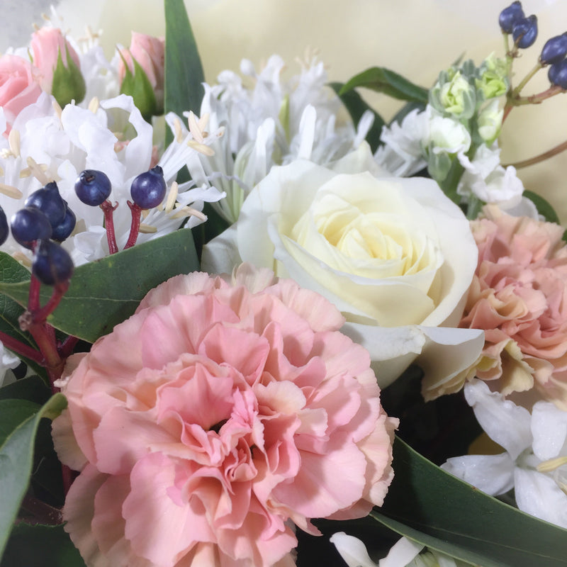 White roses being arranged by Lower Hutt florist