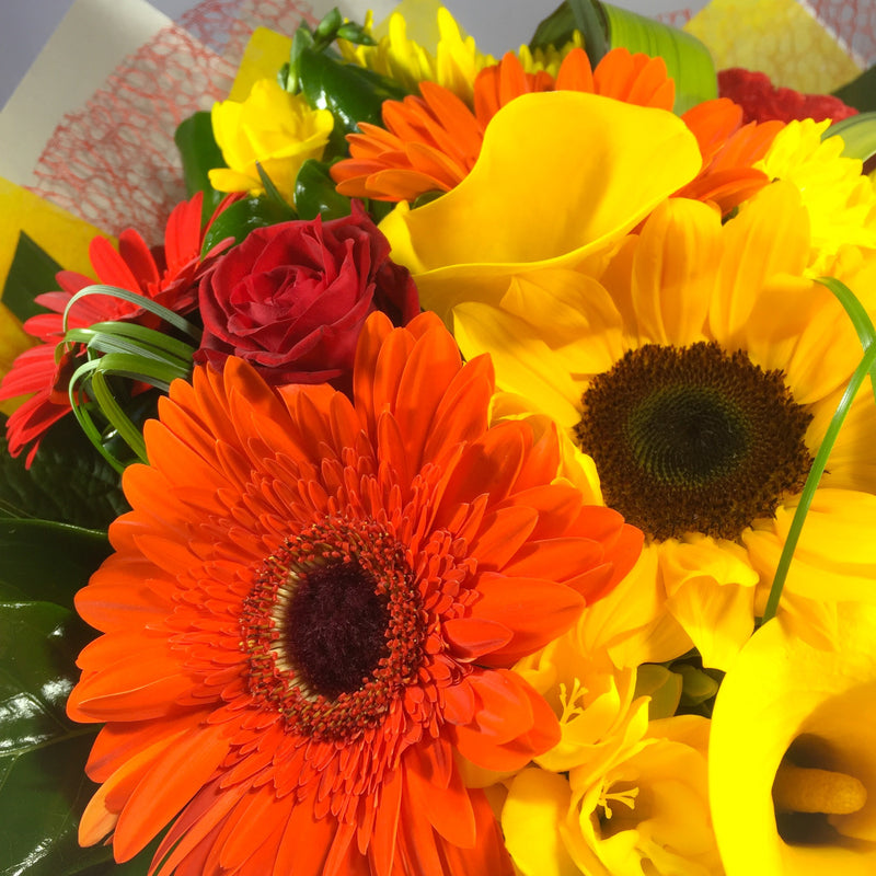 Orange and yellow flowers with florist