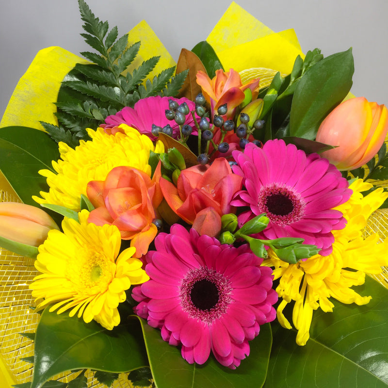 Porirua florist preparing bright flowers