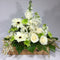 White delight floral arrangement with gerberas, roses, orchids, stock and spray chrysanthemums