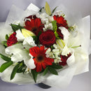 Starlight Bouquet filled with red and white flowers