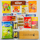 Kiwiana gift hamper filled with New Zealand food like L&P and chocolate fish.