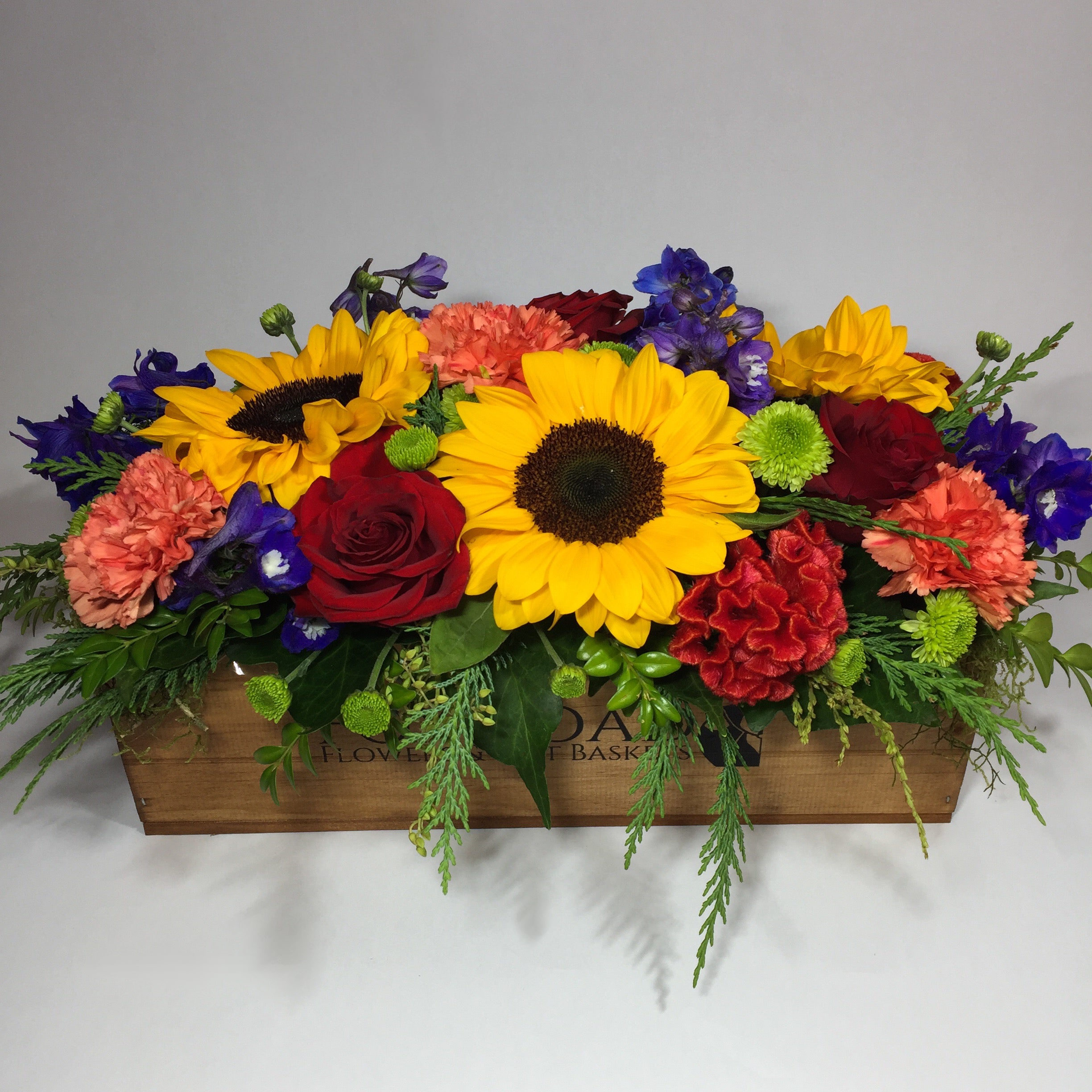 fresias and pink roses in a Fox Road bag