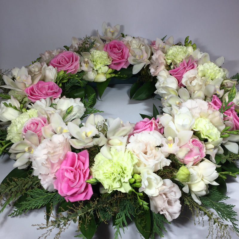 Stunning flower wreath with greenery for memorial service
