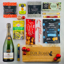 Sparkling wine with nuts packed outside a wooden gift crate