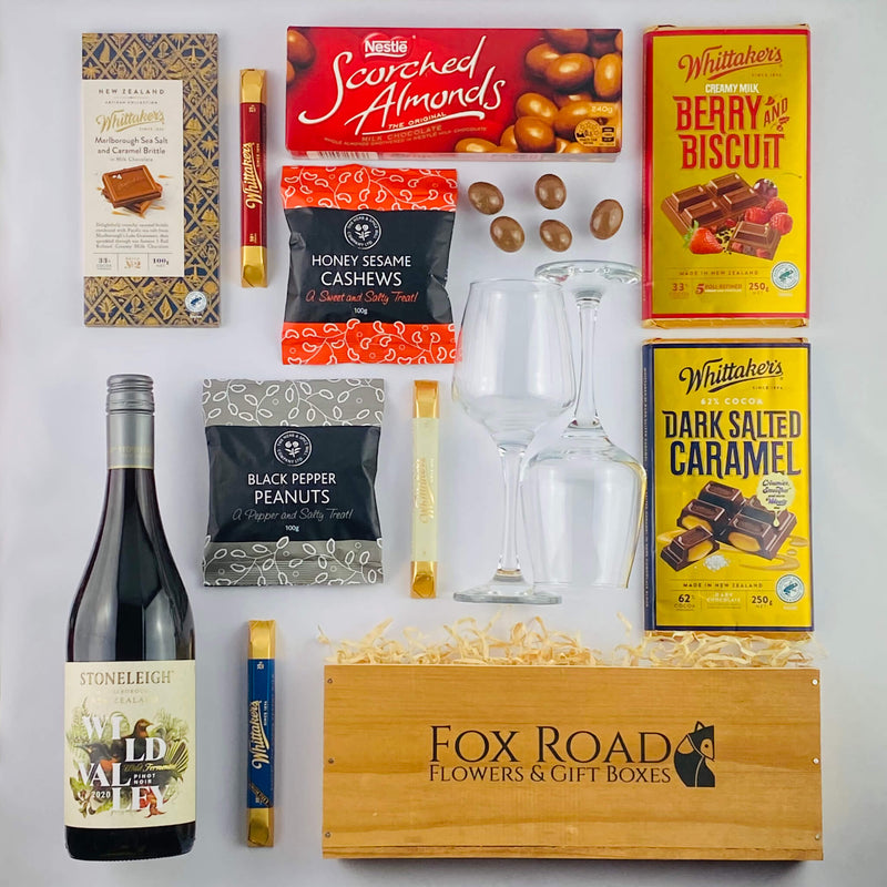 Fox Road branded gift box with Wellington chocolates and wine.