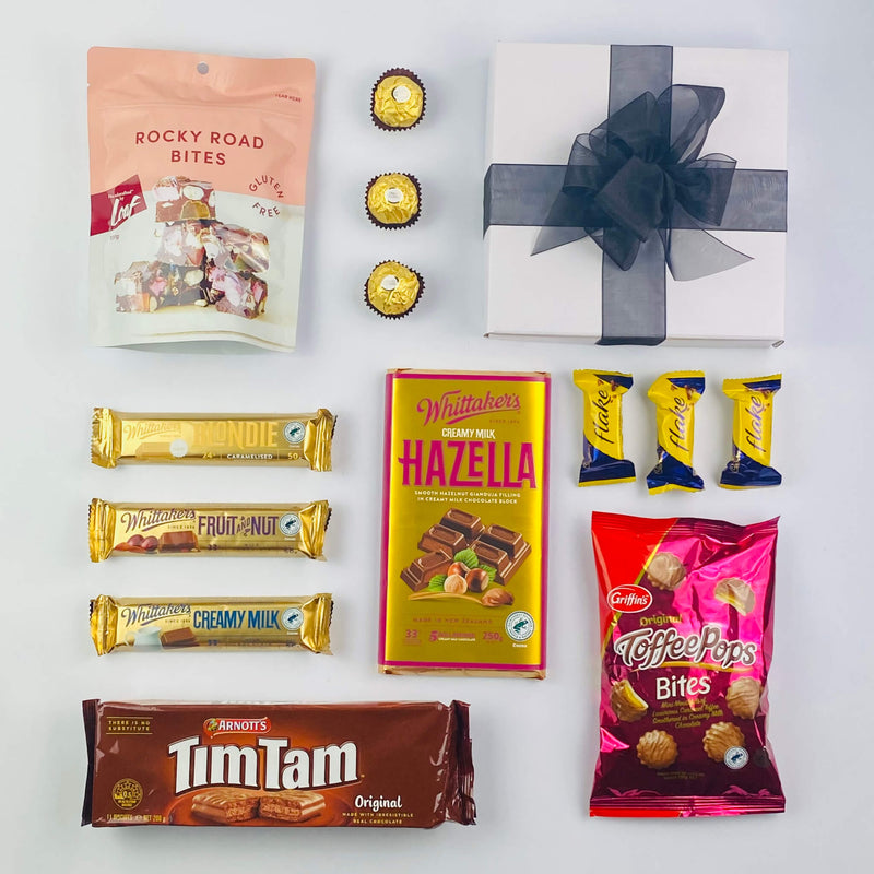 Mega chocolate gift hamper with box and ribbon.