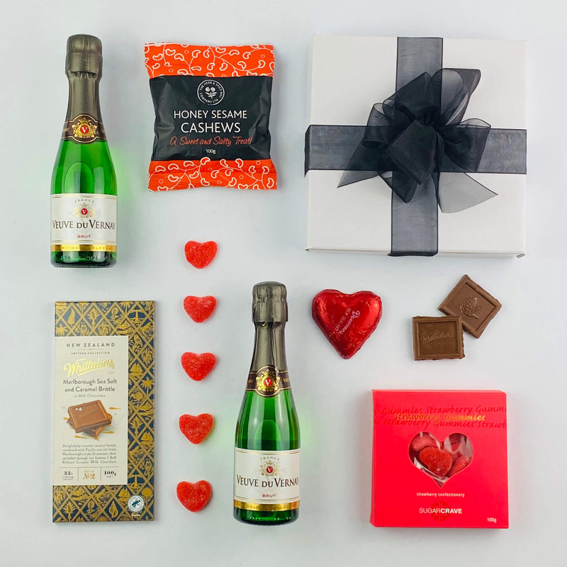 Romantic gift box with wine and strawberry gummies