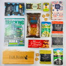 NZ Trucking Magazine with snacks by wooden gift box.